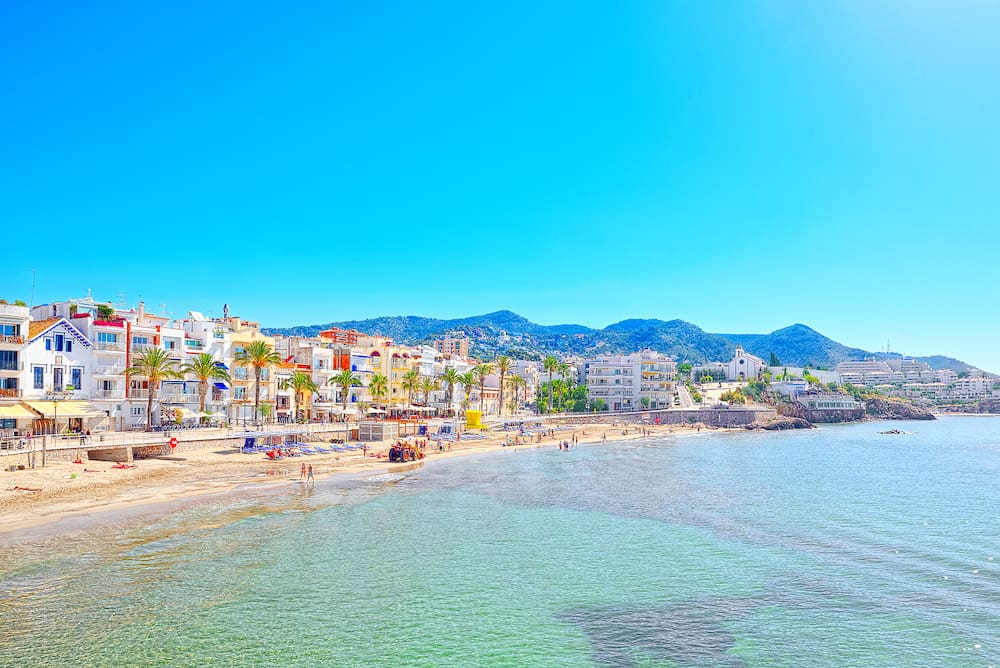 Sitges, Spain - View of the beach and the sea shore of a small resort town Sitges in the suburbs of Barcelona.