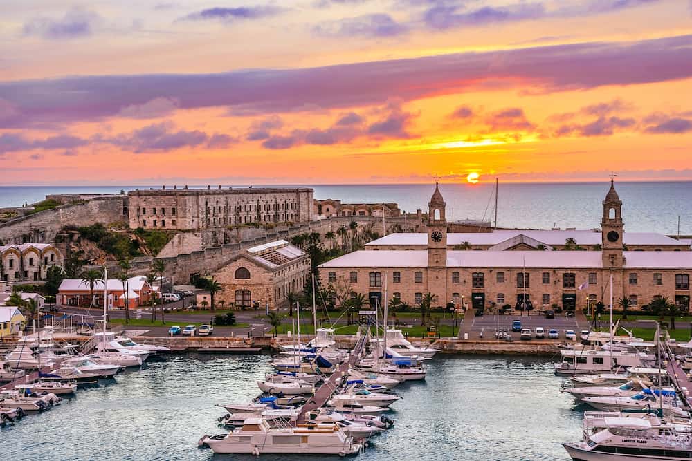KINGS WHARF BERMUDA Kings Wharf at sunset with the clock towers and Casemates Prison 