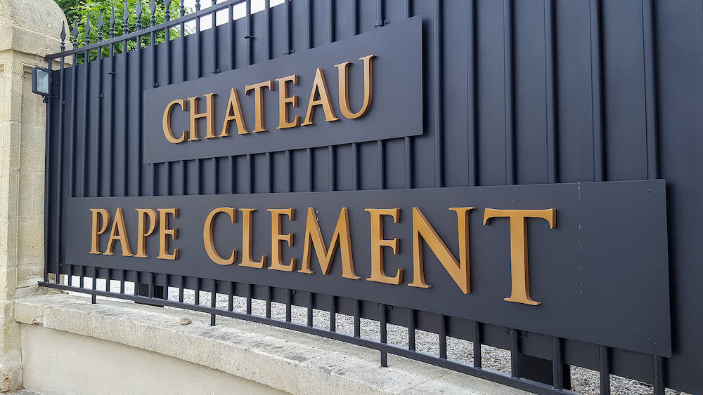 Bordeaux , Aquitaine France - chateau pape clement logo and text sign on facades of oldest wine estate in Bordeaux