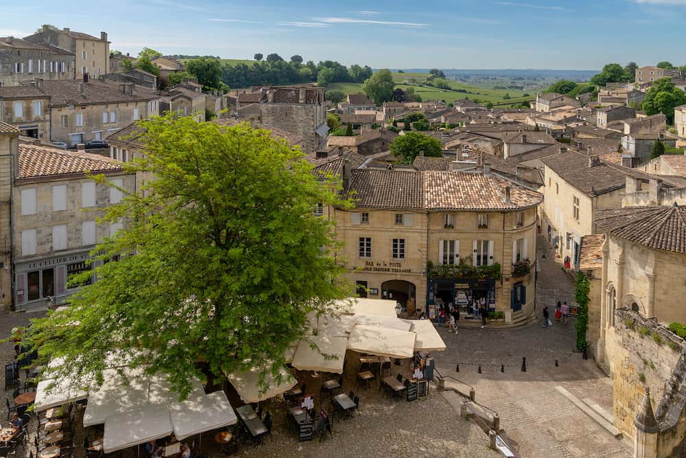 Saint-Emilion, France - village square with shops and restaurants in the picturesque and historic medieval village of Saint-Emilion in France