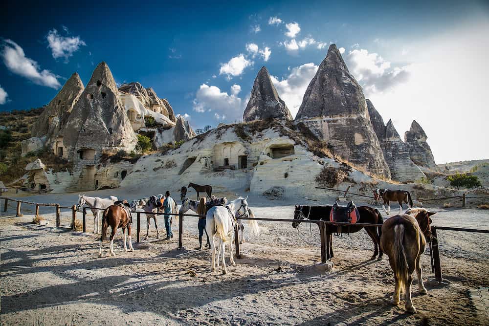 Goreme, Cappadocia- Local people rent horses for riding and photography in Love Valley in Cappadocia, Goreme, Turkey.