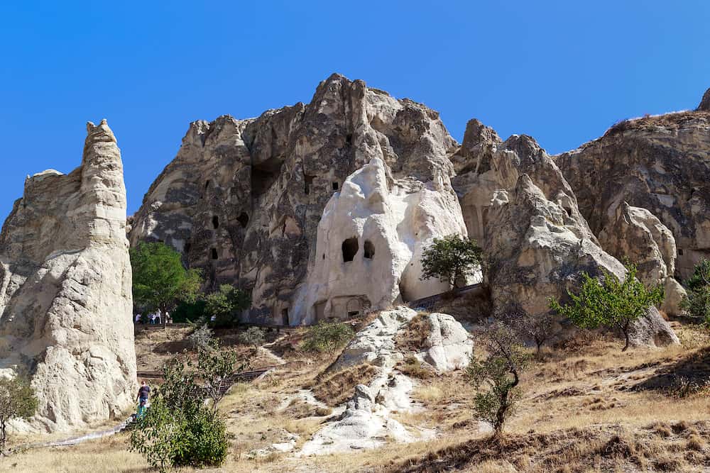 GOREME, TURKEY - These are tuff rocks of volcanic origin with cave-cells and churchs of the former ancient Christian monastery in the open-air museum.