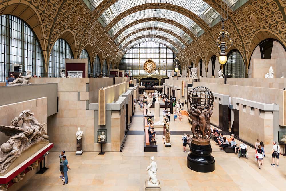 Paris France - Main hall of the Orsay Museum. The Musee d'Orsay is a museum in Paris on the left bank of the Seine river. Musee d'Orsay has the largest collection of impressionist paintings in the world.