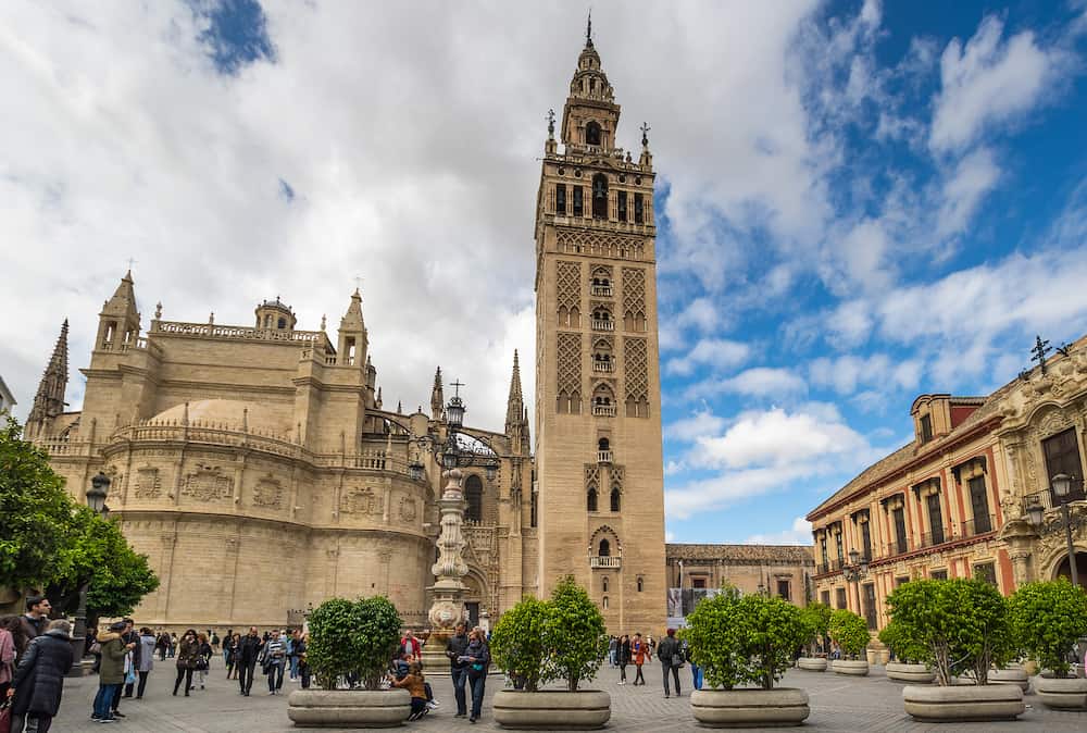 SEVILLE, SPAIN - View of the Cathedral of Seville with the Giralda in Seville, a big tourist centre in Spain
