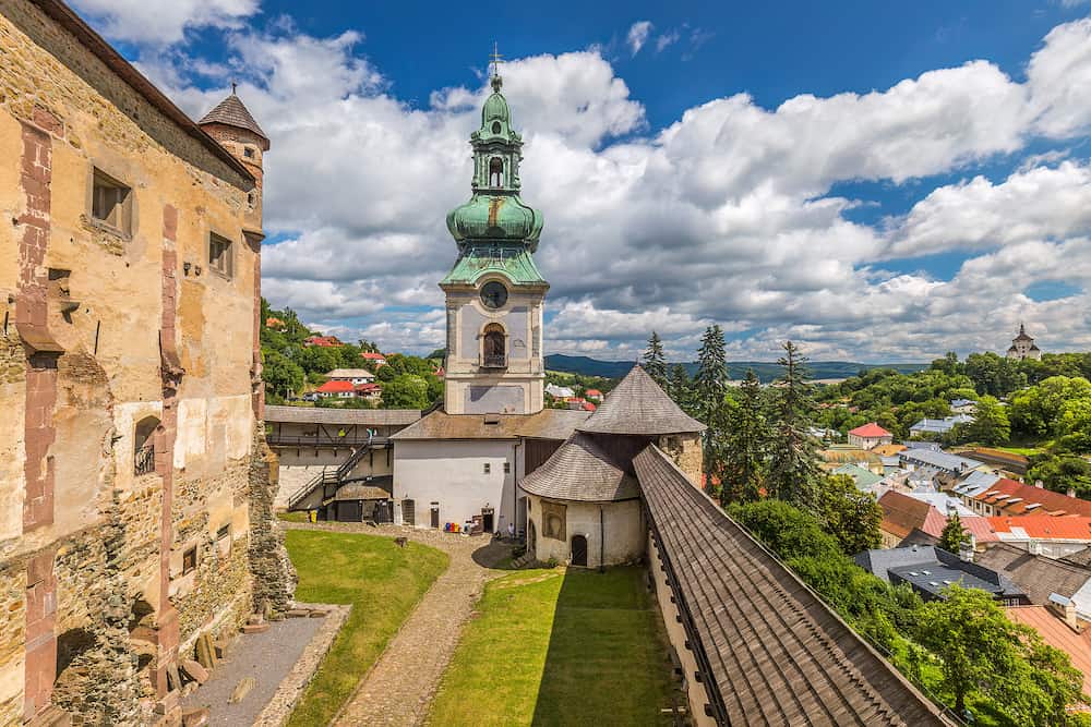 Clock tower of The Old Castle in Banska Stiavnica at summer, Slovakia, Europe.