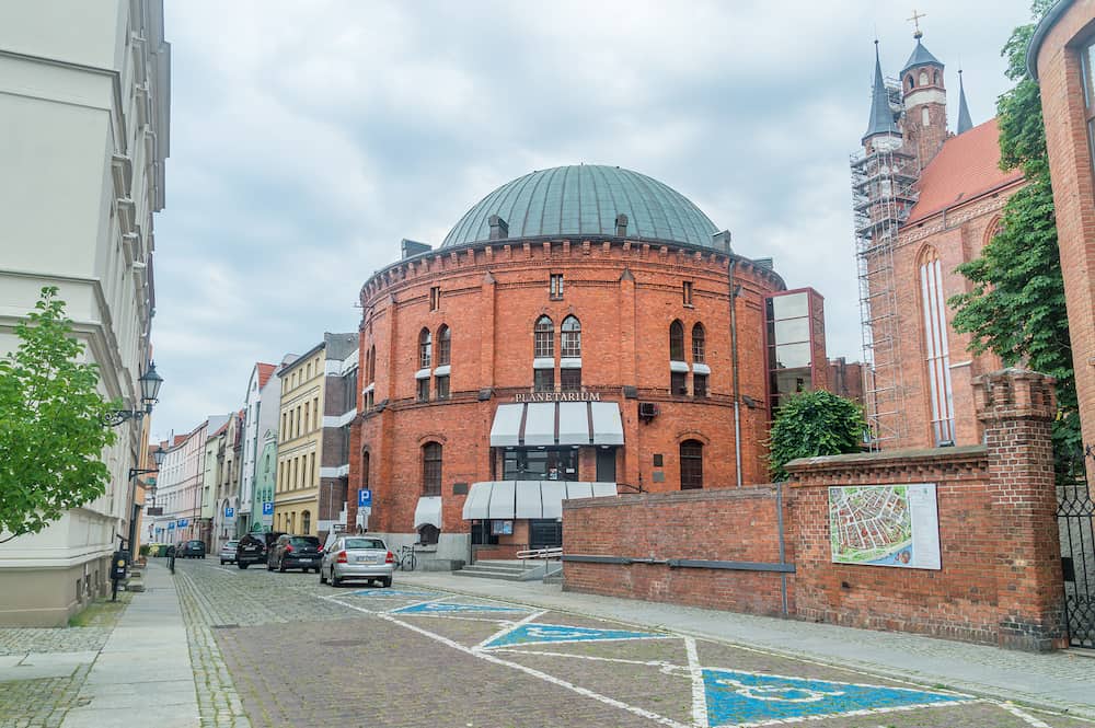 Torun, Poland - Building of Wladyslaw Dziewulski Planetarium at cloudy day.