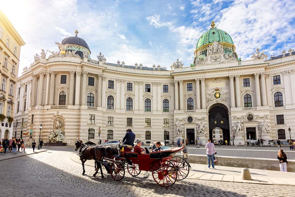 Vienna, Austria - Horse carriage at Hofburg palace on St. Michael square (Michaelerplatz)