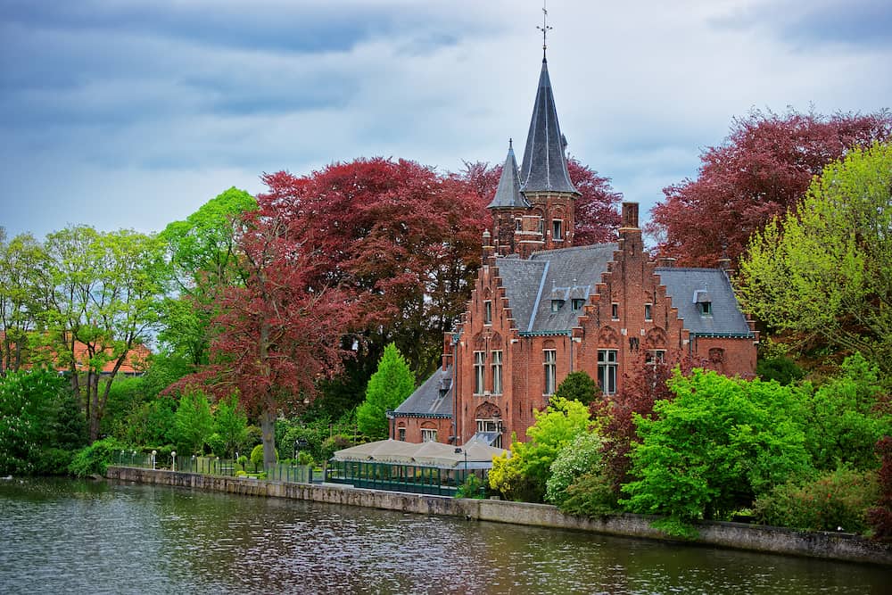Minnewaterpark and Minnewater lake in the old city of Brugge Belgium.
