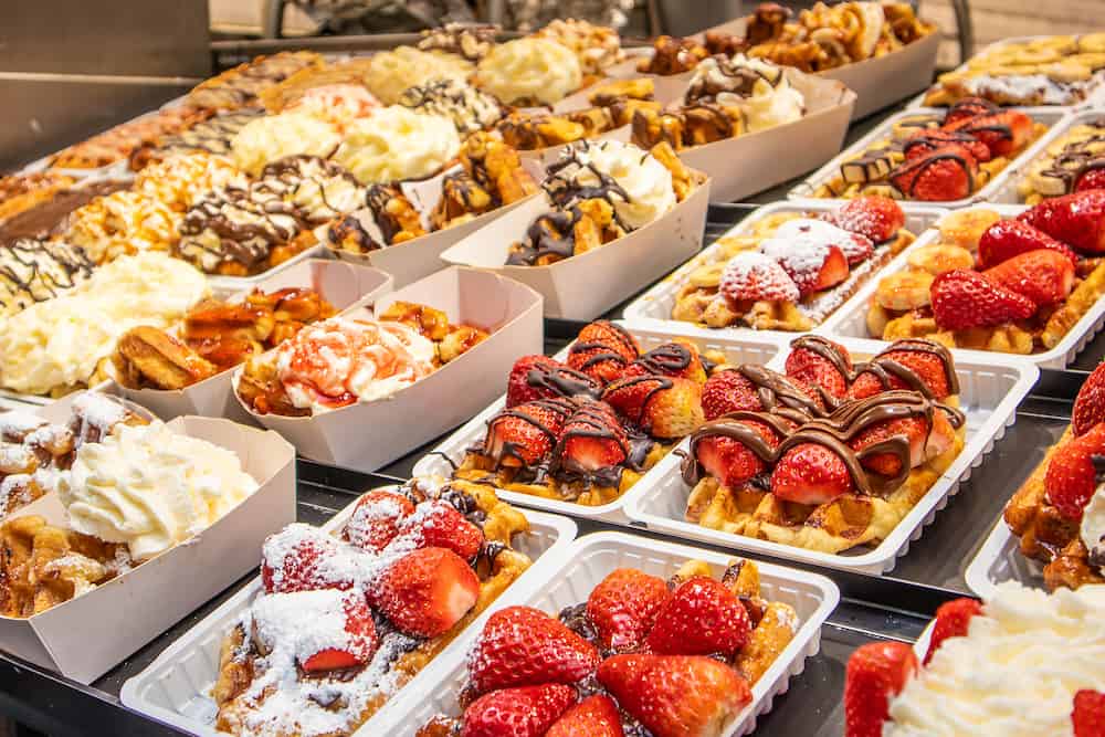 Showcase with Traditional Belgian waffles in Bruges, Belgian, Europe
