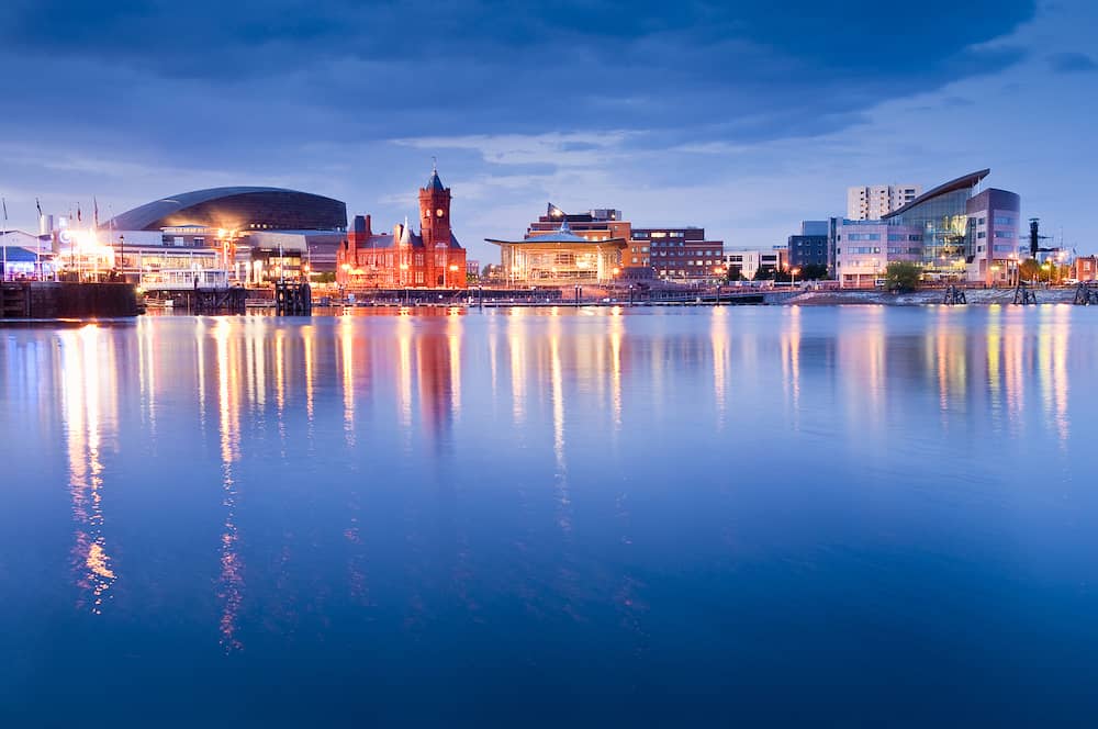 Pretty night time illuminations of the stunning Cardiff Bay many sights visible including the Pierhead building (1897) and National Assembly for Wales.