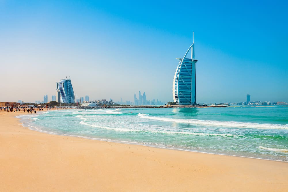 DUBAI, UAE - Burj Al Arab luxury hotel and Jumeirah public beach in Dubai city in UAE