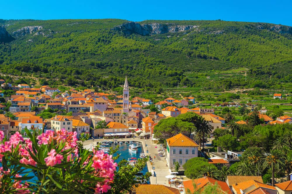 Idyllic travel and excursion destination. Mediterranean old fishing and touristic village with harbor. Jelsa village, Hvar island, Dalmatia, Croatia, Europe