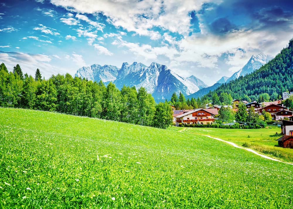 Beautiful view on little mountainous village, Seefeld in Tirol is an old farming village, major tourist resort in Innsbruck-Land District in Austria, Europe