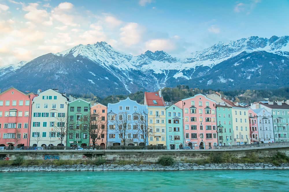 Old town of Innsbruck and snowcapped karwendel mountains at sunset in Tyrol, Austria