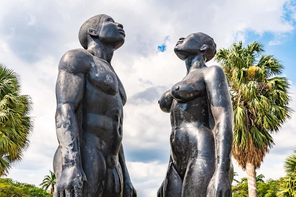 Saint Andrew, Jamaica - "Redemption Song" an 11 foot bronze statue by Laura Facey at the entrance to Emancipation Park in New Kingston, Jamaica, featuring a nude couple, standing.