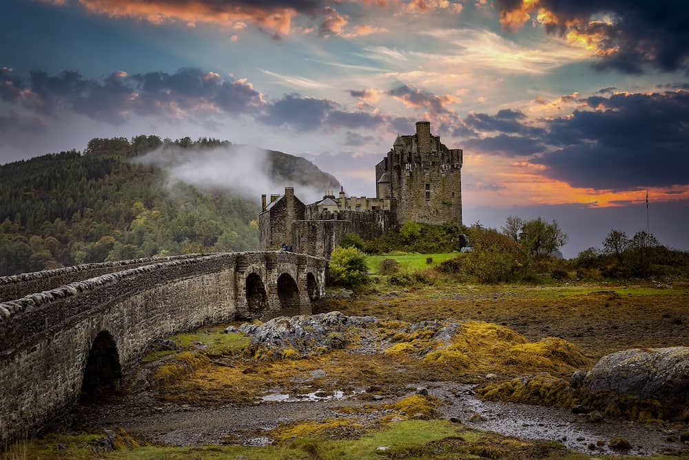 Sunset autumn view of the Eilean Donan Castle in the Highlands of Scotland