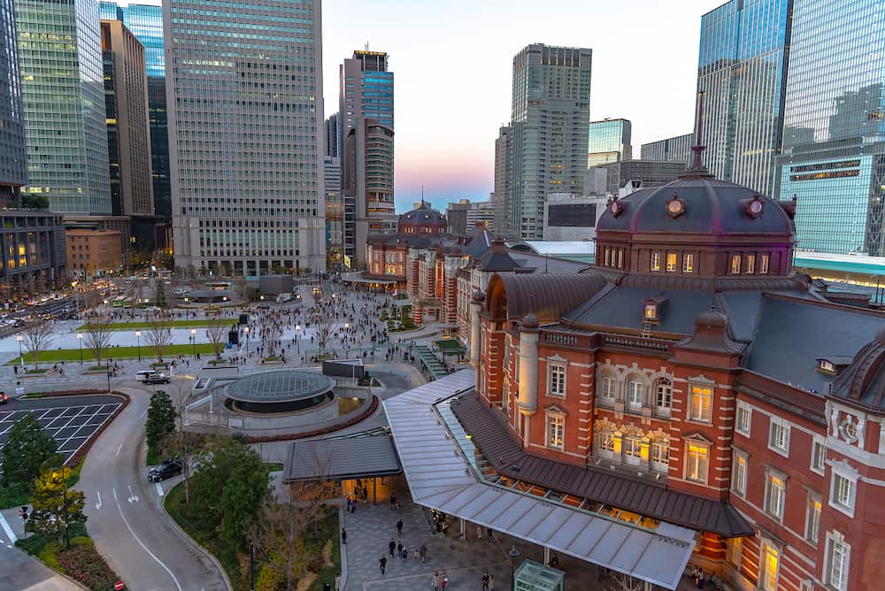 View of Tokyo station building at twilight time. Marunouchi business district, Tokyo, Japan.