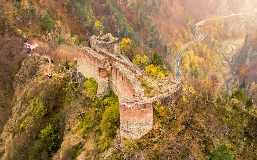 Ruined Poenari Castle in romania mountains
