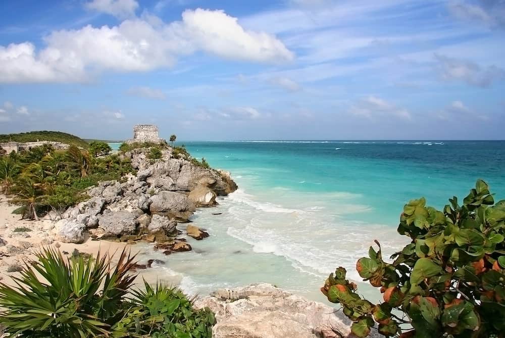 Scenic view of Mayan ruins by the Caribbean sea in Tulum Mexico