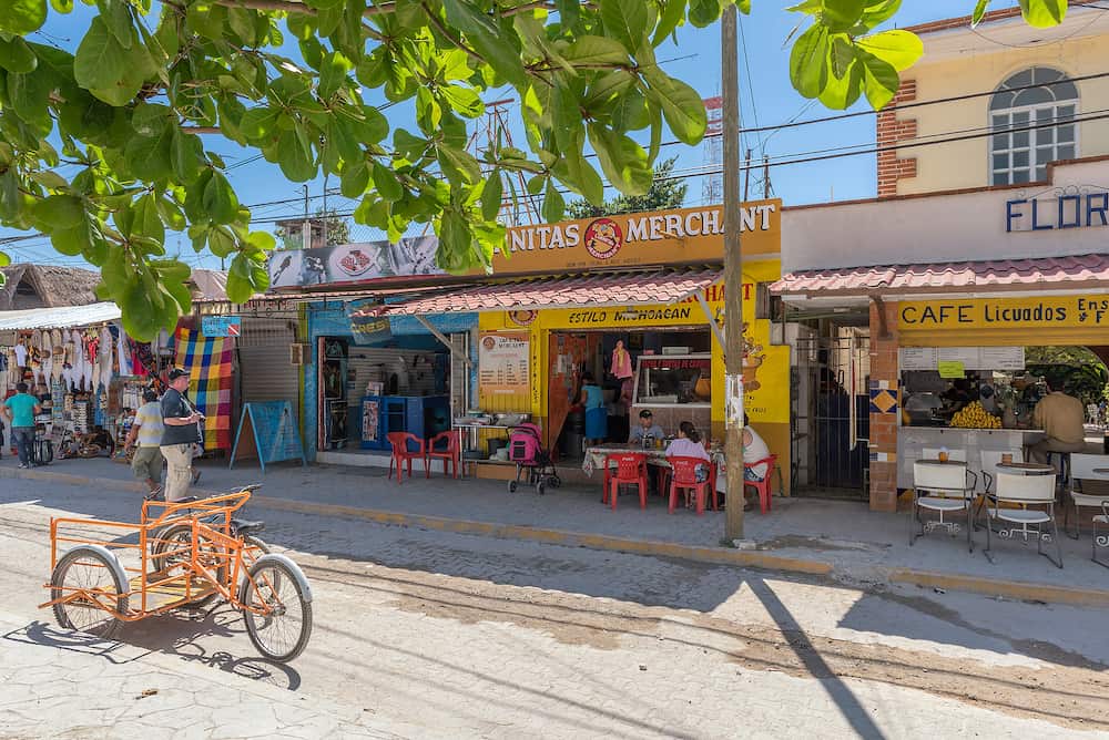 TULUM, MEXICO- shops and restaurants on the main street of Tulum, Quintana Roo, Mexico