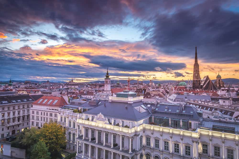 Vienna old town buildings and St Stephen Cathedral at sunset, Austria