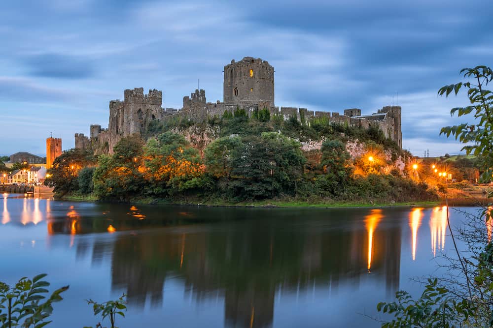 Pembroke Wales United Kingdom - Panoramic view of Pembroke Castle in South Wales at night