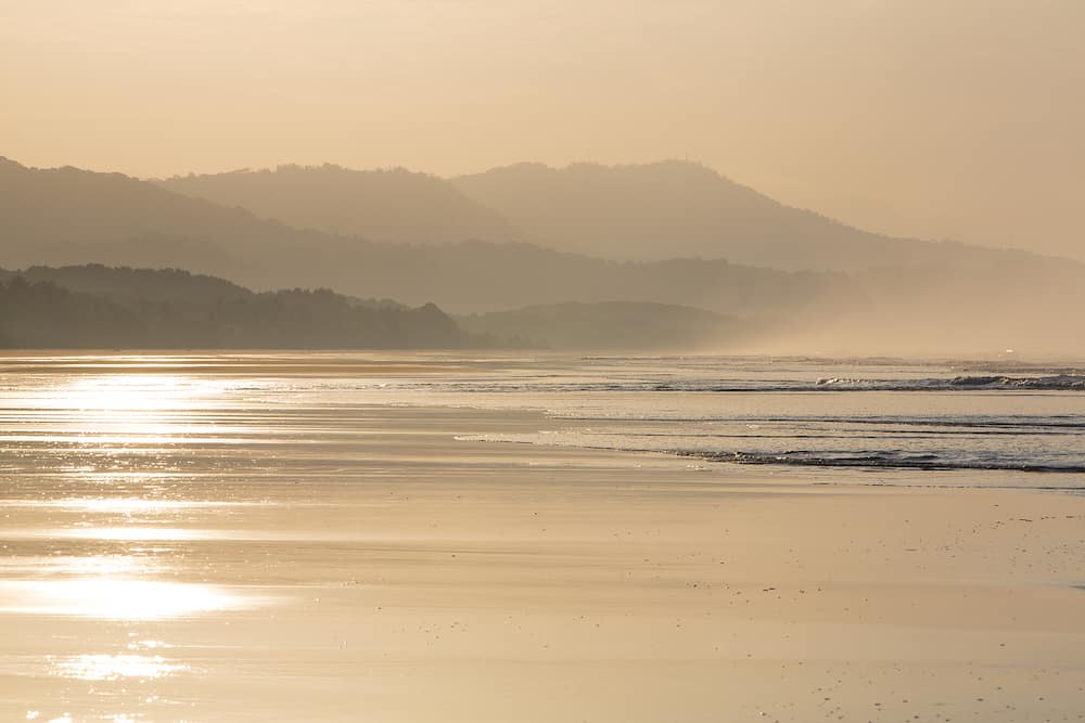 Mystical sunrise view on the beach of Matapalo, Costa Rica. Matapalo is located in the Southern Pacific Coast.
