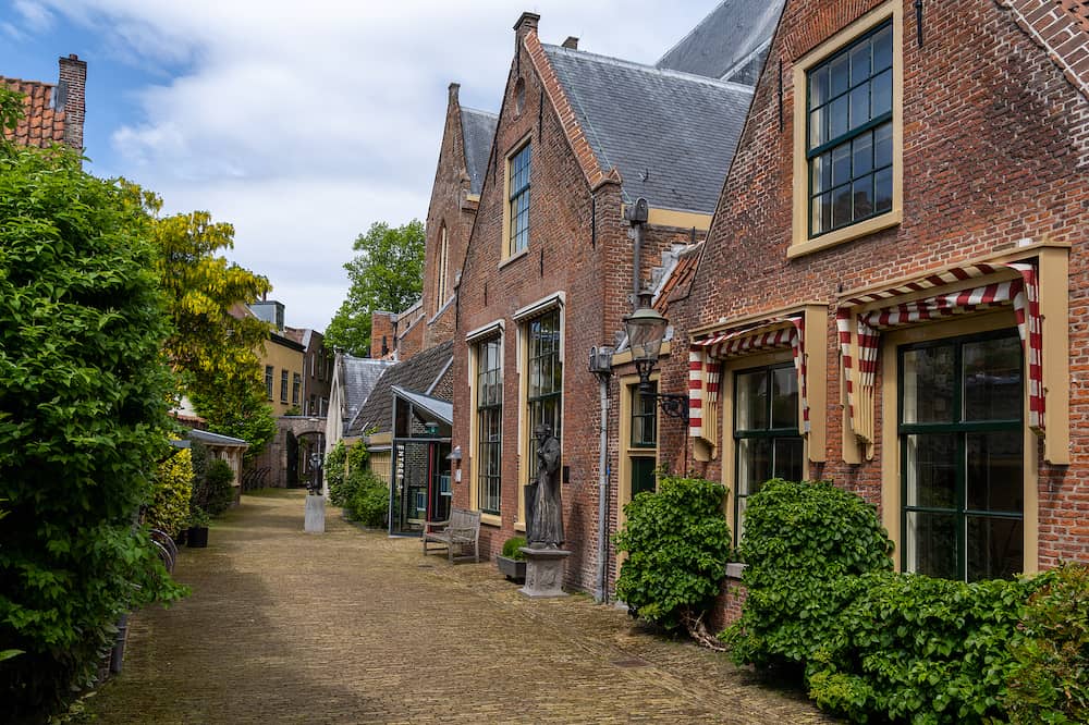 Haarlem, Netherlands - picturesque neighborhood street with red brick buildings in the historic city center of Haarlem