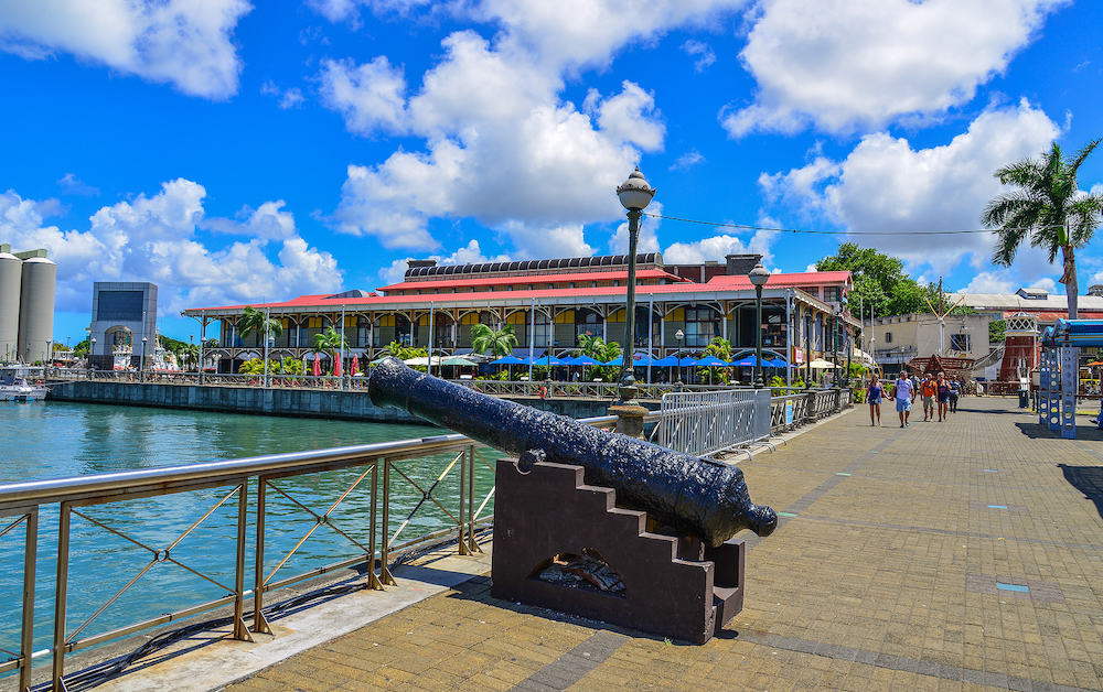 Port Louis, Mauritius - An ancient cannon at Caudan Waterfront in Port Louis, Mauritius. Port Louis is the country economic, cultural and political centre.