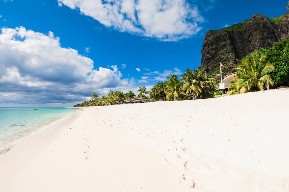 Tropical landscape - luxury beach with ocean, mountain and sky of Mauritius island, Le Morne