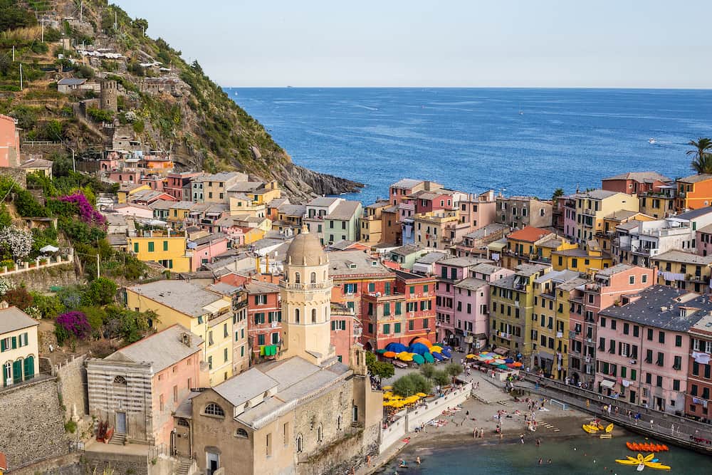 Vernazza, Italy - View of Santa Margherita di Antiochia Church and Colorful Houses with Ligurian Sea in the Background