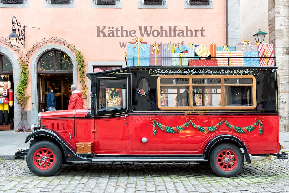 ROTHENBURG, GERMANY - The famous Christmas store with its museum is open all year long and attracts tourists with a red oldtimer bus.