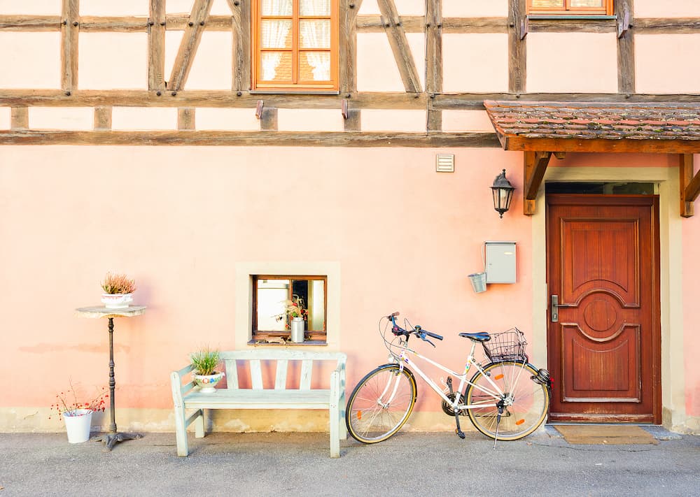 wall of half-timbered old house painted in pink - details of Rothenburg ob der Tauber, Germany