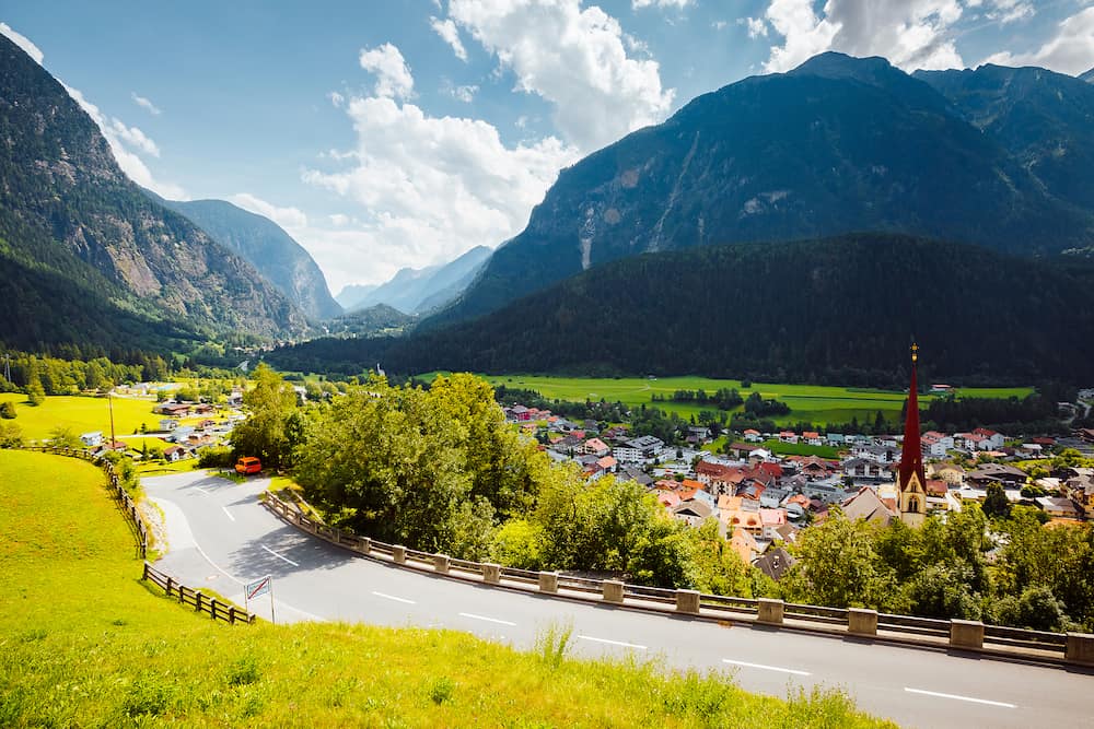 Tranquil summer scene in Oetz village on a sunny day. Location place Austrian Alps, Imst district of Tyrol, Austria, Europe. Scenic image the concept of active travel. Discover the beauty of earth.