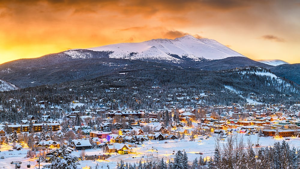 Breckenridge, Colorado, USA town skyline in winter at dusk.