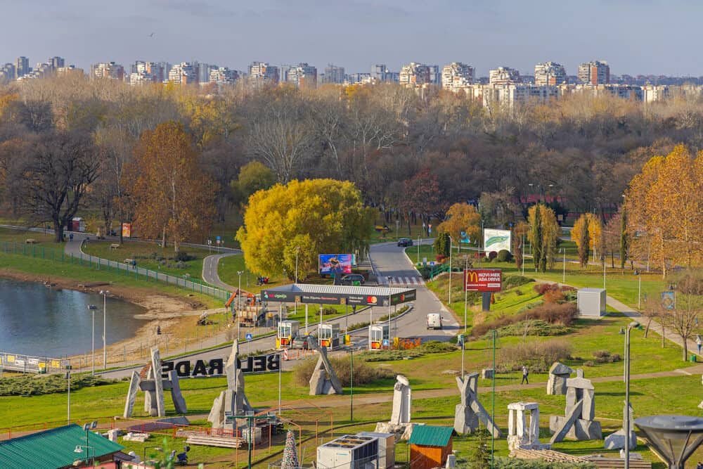 Belgrade, Serbia - Car Entrance Gate to Ada Ciganlija Recrational Lake and Park Aerial View at Fall Day.