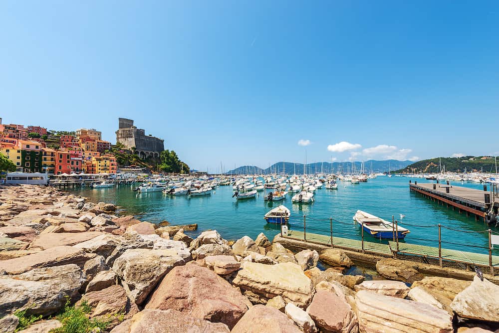 Port of Lerici town with many boats moored. Tourist resort on the coast of the Gulf of La Spezia, Mediterranean sea (Ligurian Sea), Liguria, Italy, Europe.