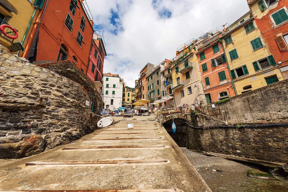 RIOMAGGIORE, ITALY - The famous Riomaggiore village, view from the small port, Cinque Terre National Park in Liguria, La Spezia, Italy, Europe. UNESCO world heritage site.