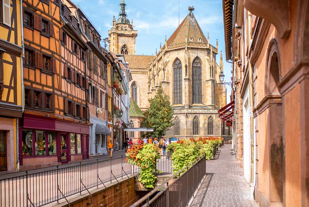Cityscaspe view on the old town with saint Martin cathedral in Colmar, famous french town in Alsace region