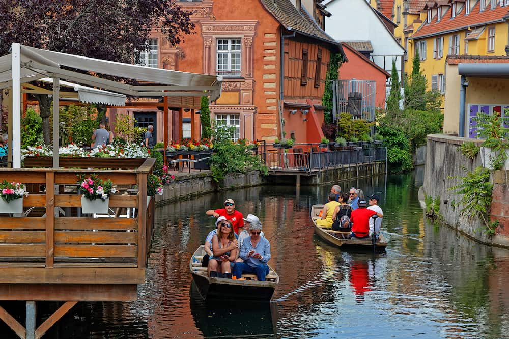 COLMAR, FRANCE - Cruise on the Lauch river. Petite Venise is a picturesque tourist area, named after Venice, Italy, for picturesque historical organization around its canals.