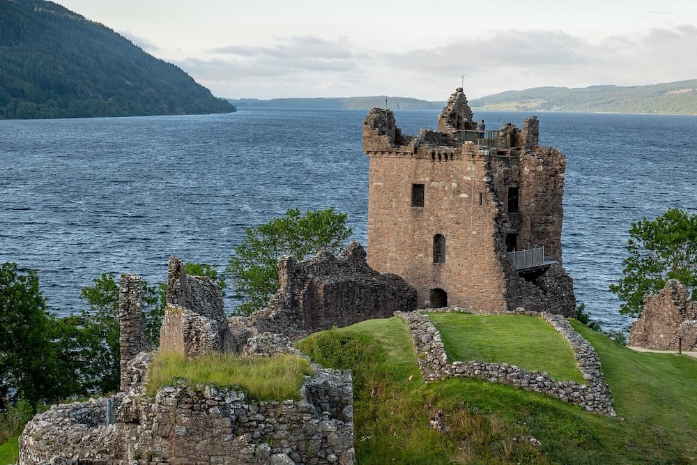 Ancient tower of Urquhart Castle in late afternoon near Drumnadrochit city in Scotland Highlands, UK