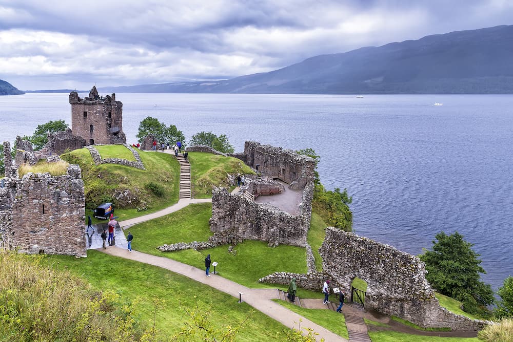 Drumnadrochit, United Kingdom - View of Urquhart Castle ruins beside Loch Ness, in the Highlands of Scotland