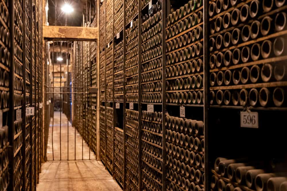 Keeping for years of old bottles of red rioja wine in cellars, wine making in La Rioja region, Spain
