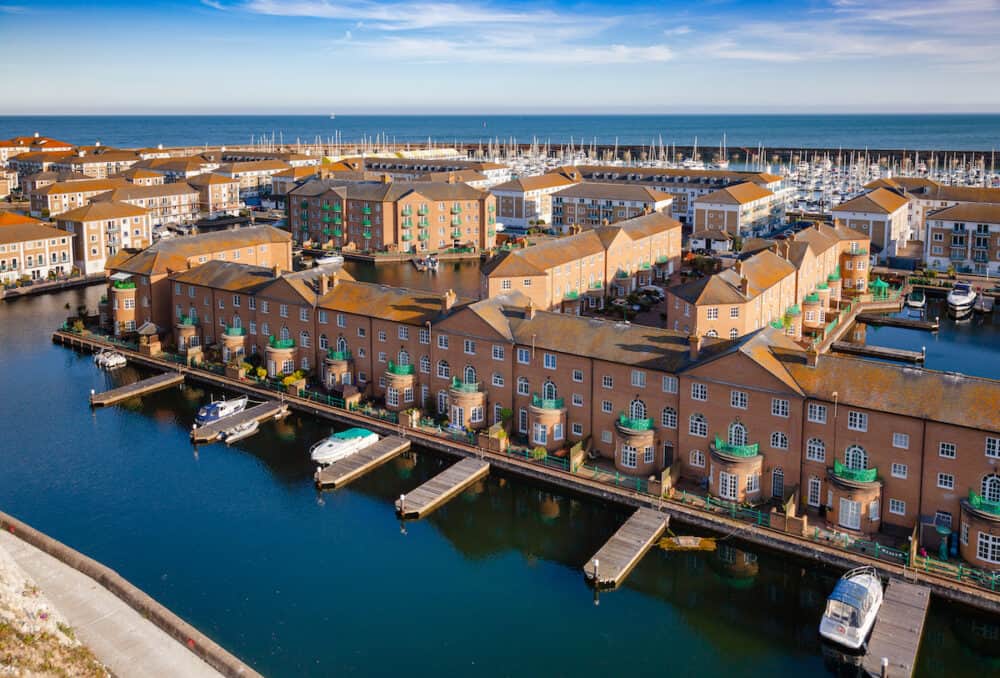 BRIGHTON, UK - Aerial view of artificial Brighton Marina, a popular housing and leisure complex with yachting marina
