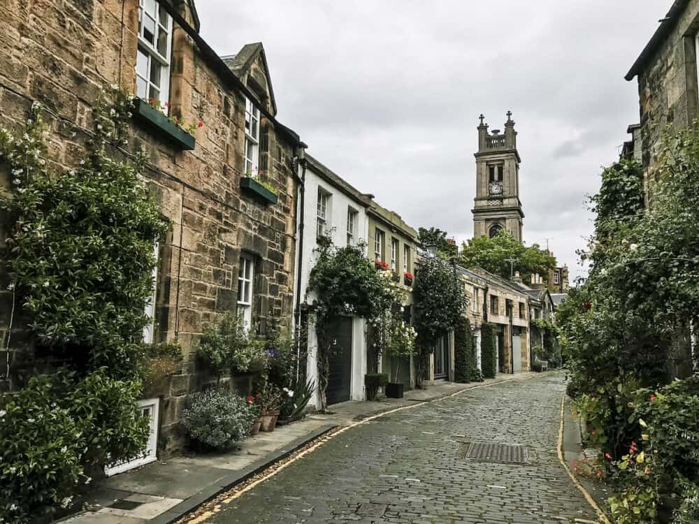 EDINBURGH SCOTLAND - The curve of a beautiful traditional cobbled street in Stockbridge area of Edinburgh