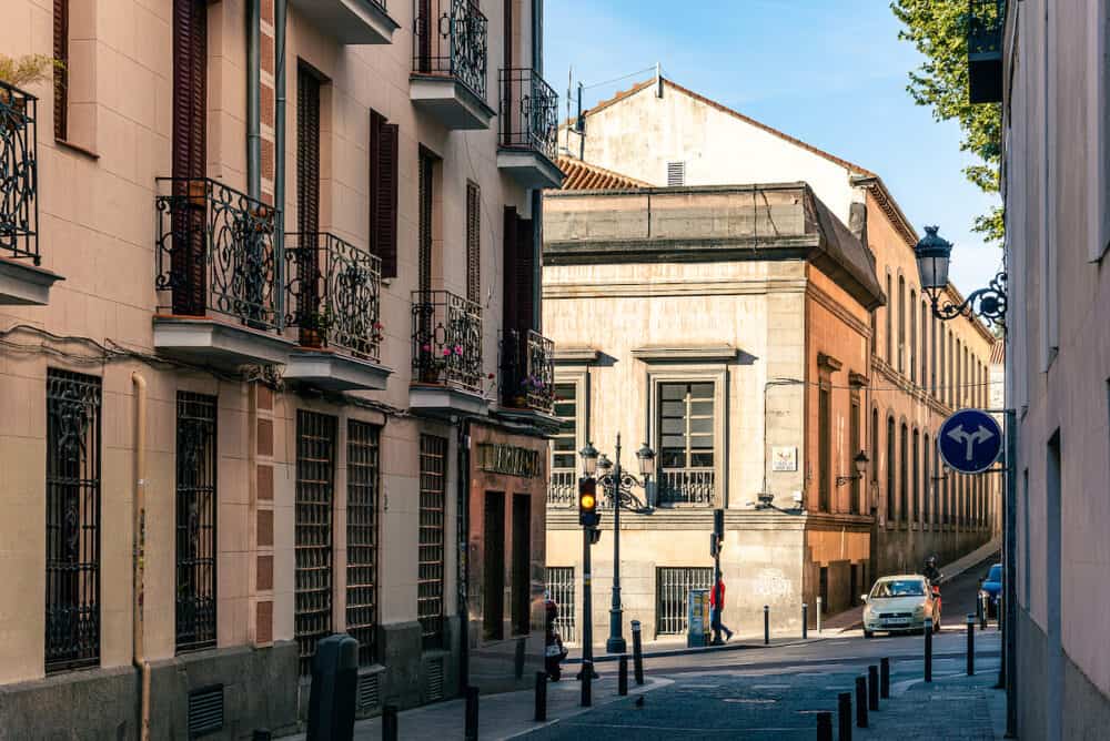 Madrid, Spain - Street in the quarter of Las Letras in Central Madrid. Narrow street near Atocha