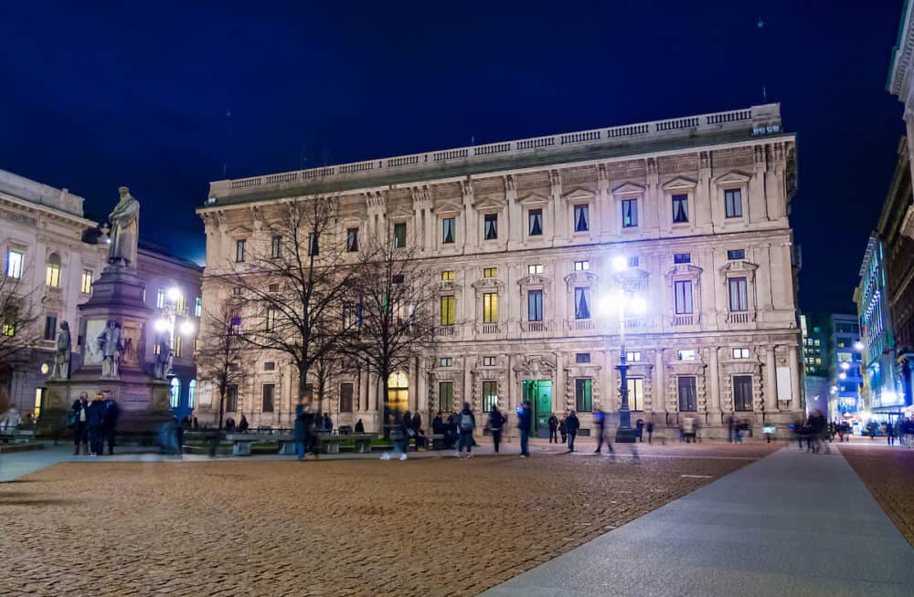 Night view of Piazza della Scala with Palazzo Marino, Milan's city hall and Leonardo Da Vinci monument, Milan, Italy Europe