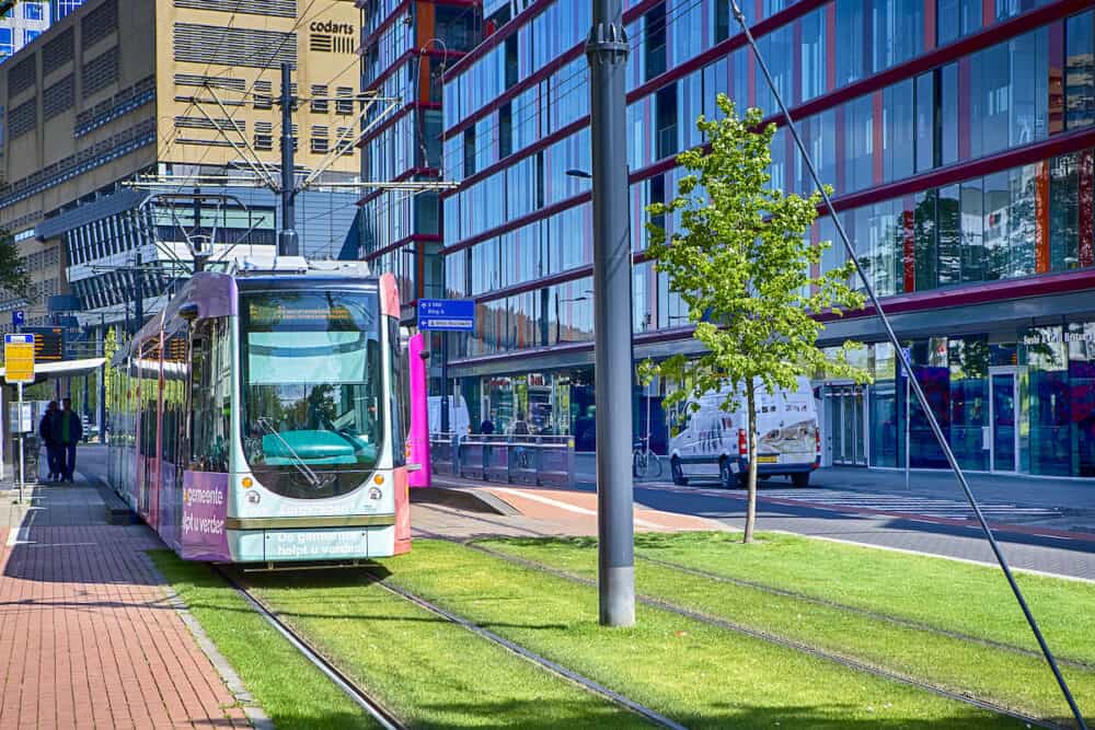 Rotterdam, Netherlands -  Modern Dutch City tram Passing Through the City of Rotterdam in Holland