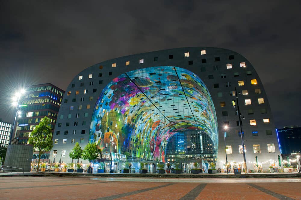 ROTTERDAM, NETHERLANDS -  Modern Market Hall in Rotterdam at night. The Markthal is a residential and office building with a market hall underneath, located in Rotterdam.