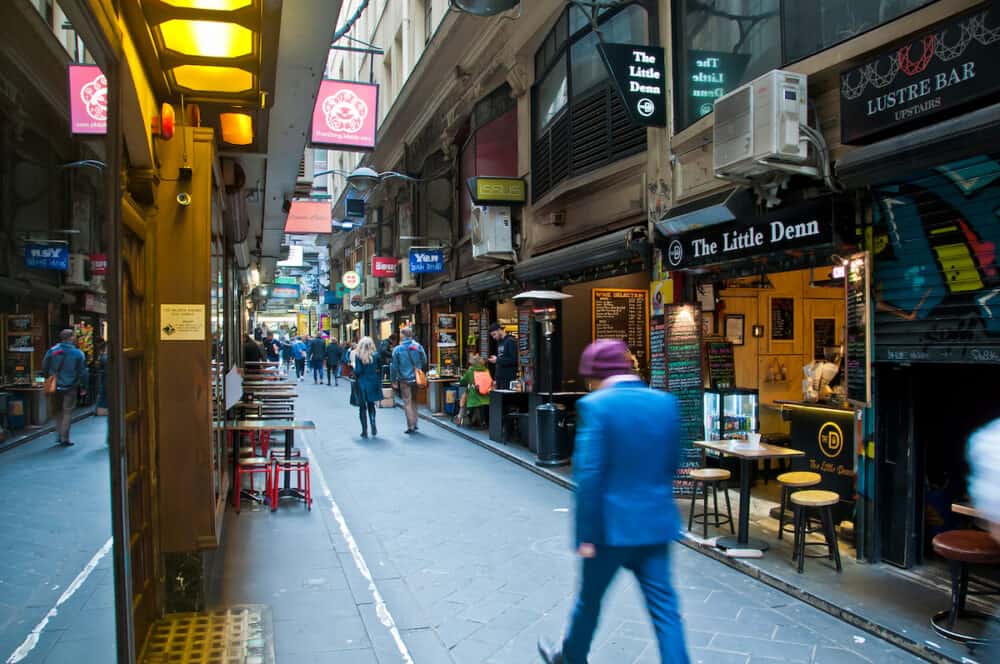 MELBOURNE, AUSTRALIA - People walk in cozy Degraves lane in morning in Melbourne Australia